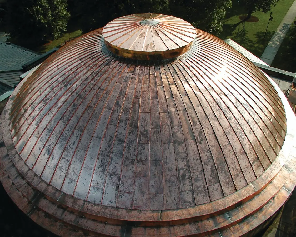 Craftsman Roofing crew installing a new roof in Durham